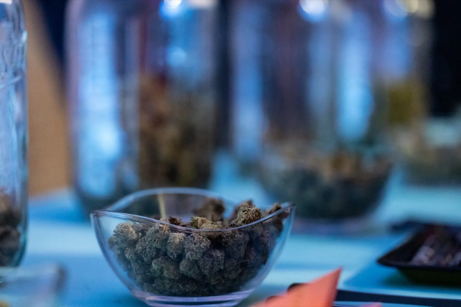 Cannabis flower buds in a glass bowl at Beleaf Brooklyn grand opening