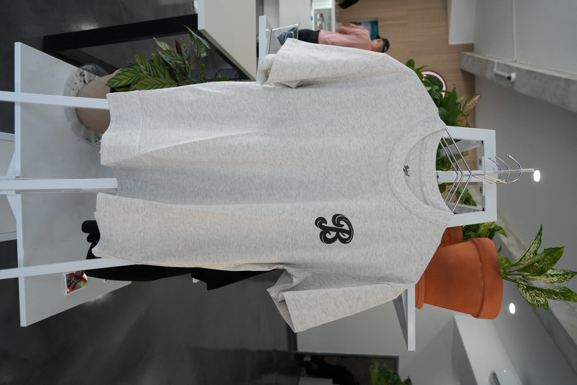 Beleaf store showing product displays and plant decor